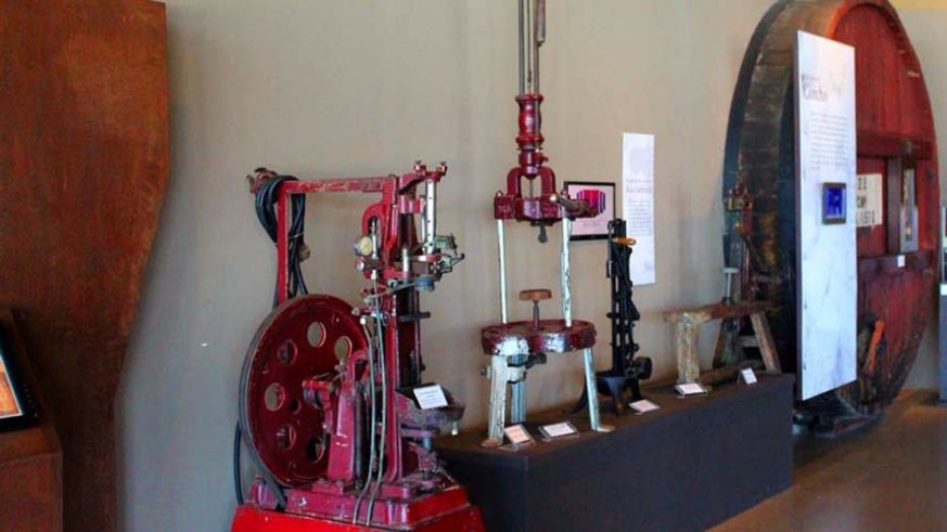 Display of bottling equipment at the wine museum.