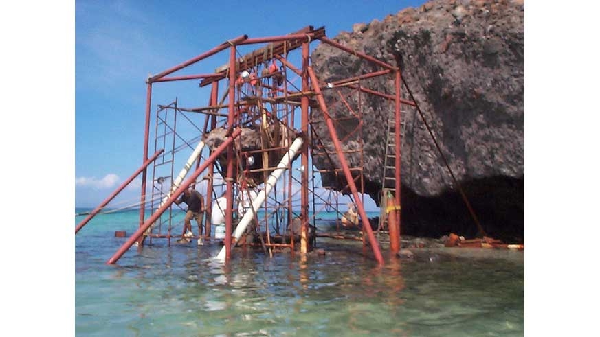 The scaffold erected around Mushroom Rock to reposition it.